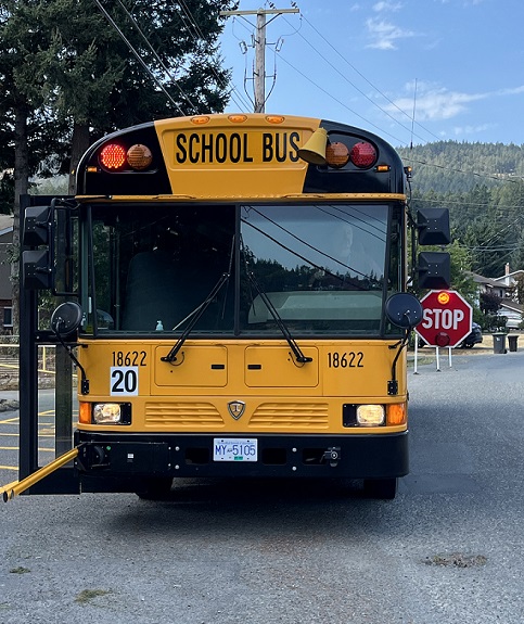 School bus with stop sign out