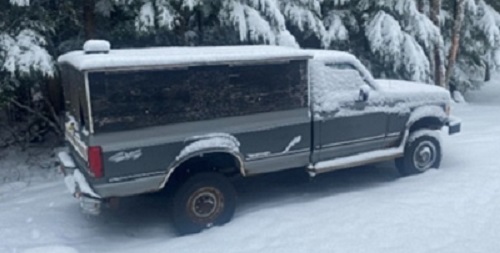 Right side view of Ford F250 with canopy