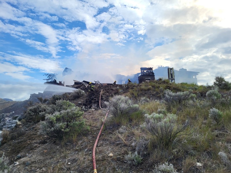 Merritt Fire Firefighters putting out a fire at an abandoned structure off of Midday Valley Road.