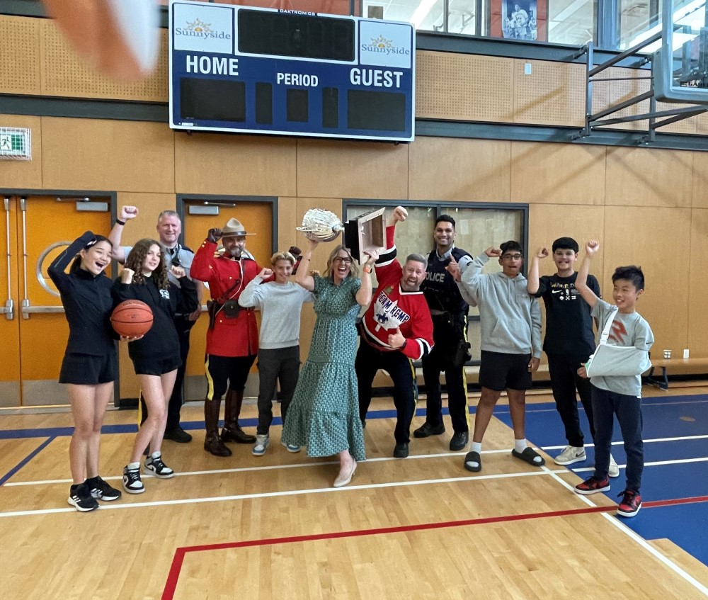 Staff Sergeant Spencer, Sergeant Jarjoura, Corporal Blakeway, and Cst. Vahra attended the school and presented the award to Principal Brandi Scott and the school.