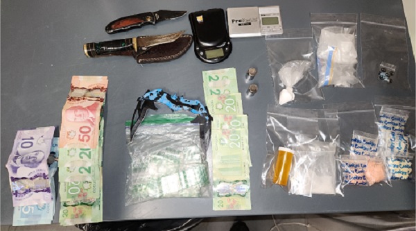 Display of weapons, drugs, drug paraphernalia from file 2024-5346
