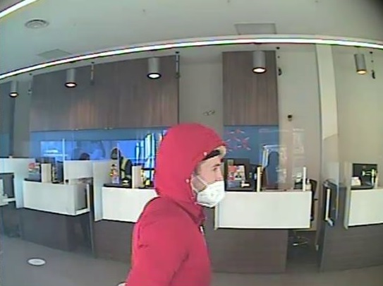 photo of male in red jacket