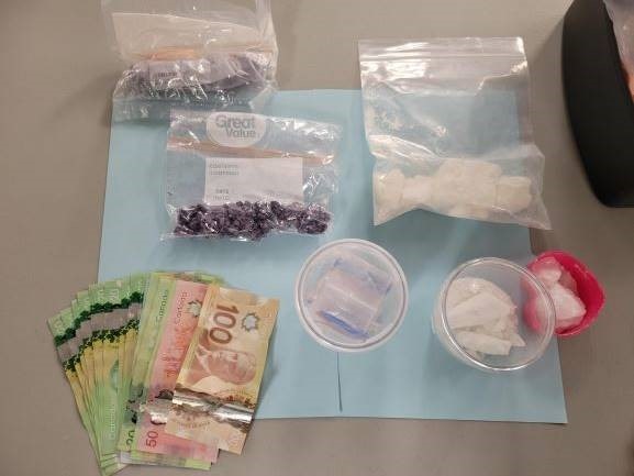 Photo of seized drugs and cash
