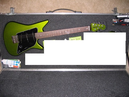 photo of green guitar
