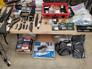 guns, ammo, suspected drugs