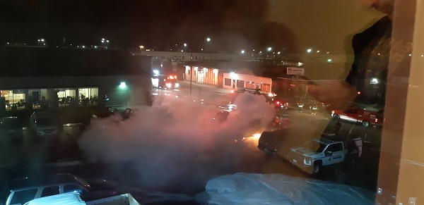 Photo of Sunshine Inn parking lot fire.