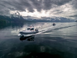 Prince Rupert RCMP boat tow's Jeff Easingwoods fishing vessel behind it near Bishop Bay.