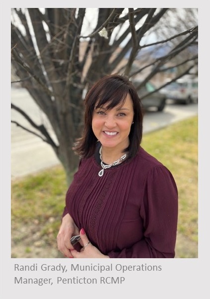 Caucasian woman standing in a purple shirt in front of a tree looking at camera. She has black hair and is wearing glasses. Text under the photo reads, Randi Grady, Municipal Operations Manager, Penticton RCMP.