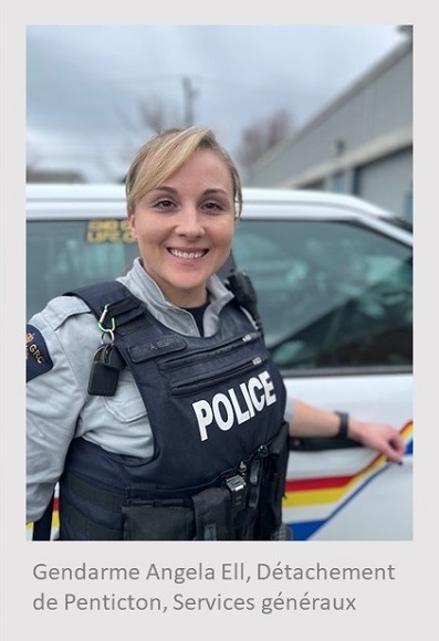 Femme blanche debout devant un véhicule de police et portant un uniforme de la GRC. Sous la photo, on peut lire : Gendarme Angela Ell, Détachement de Penticton